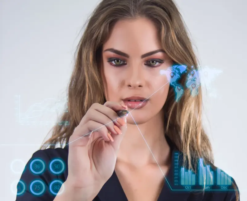 l&iacute;der feminina manipulando dados gerados pro intelig&ecirc;ncia artificial. 